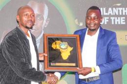 File image of Geoffrey Mosiria receiving an award.